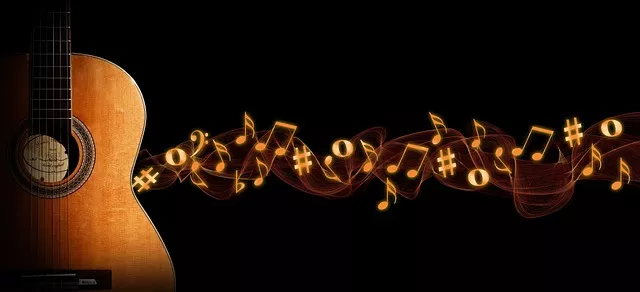 Guitare acoustique avec notes de musique lumineuses
